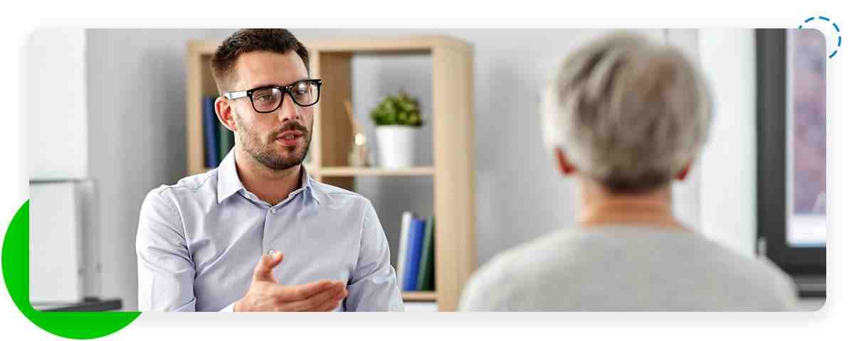 Behavioral health specialist talking with patient