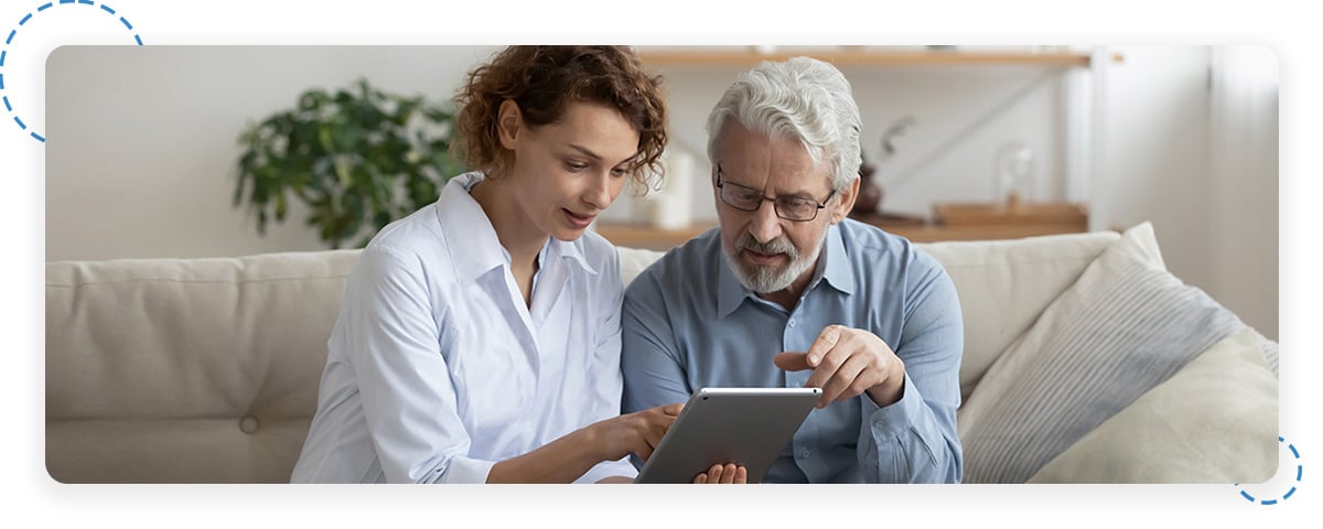 Provider and patient looking at tablet together Provider and patient looking at tablet together