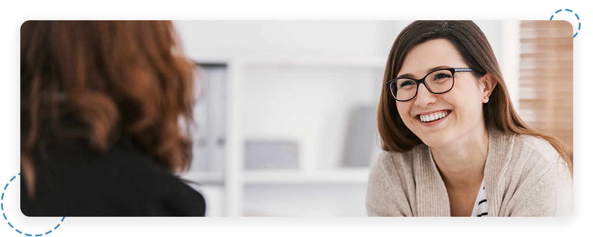 Cheerful provider talking to patient