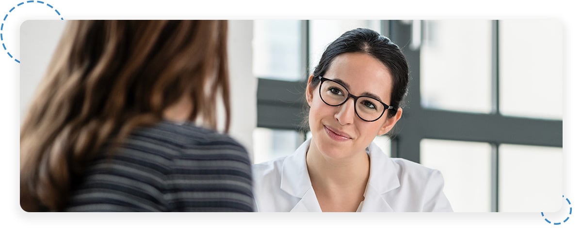 Clinician listening attentively to patient